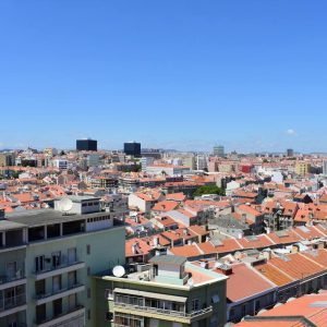 Quarto central em Lisboa — com marquise e ar-condicionado