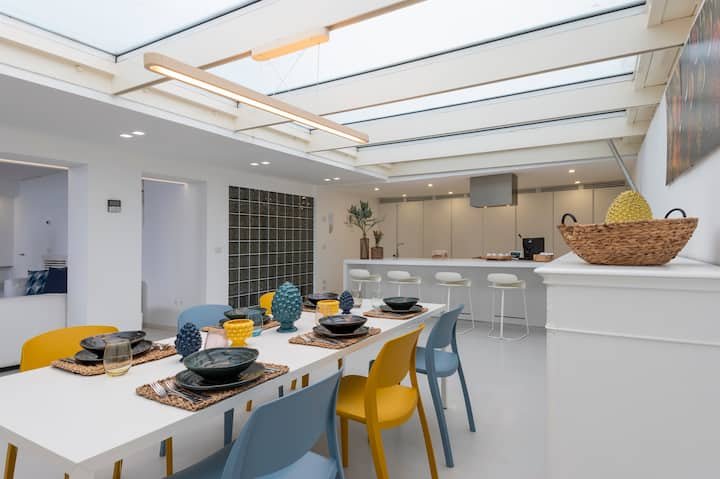 Addaura Home um terraço com vista para o mar