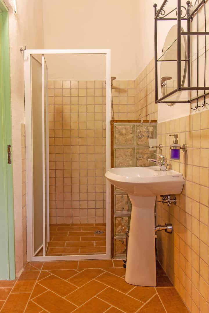 Apartamento com jardim e piscina – Il Pietrone