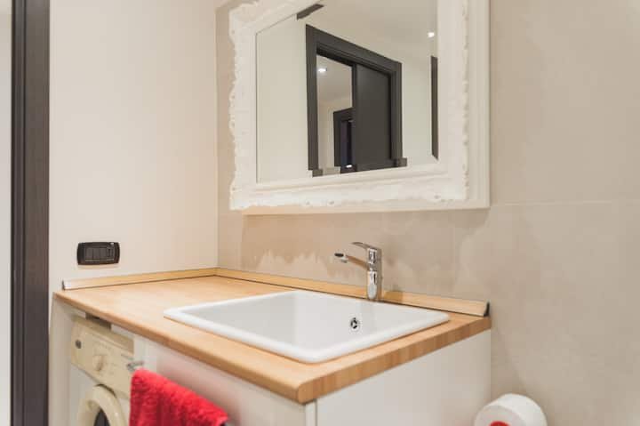 Quarto no centro com banheiro privativo