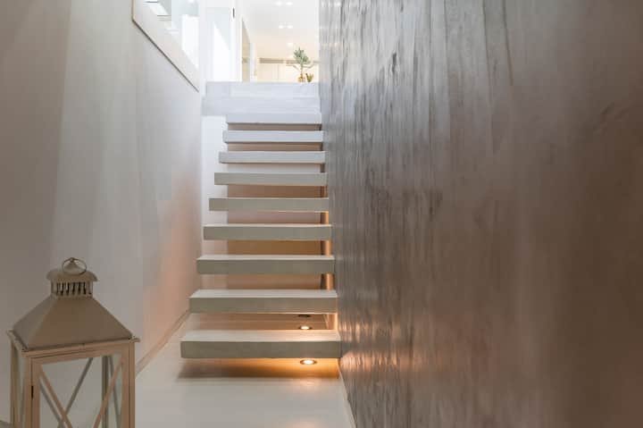 Addaura Home um terraço com vista para o mar