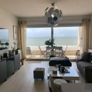 Apartamento Um casulo com vista para o mar