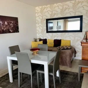 Apartamento Um casulo com vista para o mar